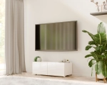 Biała stojąca szafka RTV CALERO CA4 2D 100 cm w aranżacji