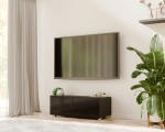 Czarna stojąca szafka RTV CALERO CA4 2D 100 cm w aranżacji